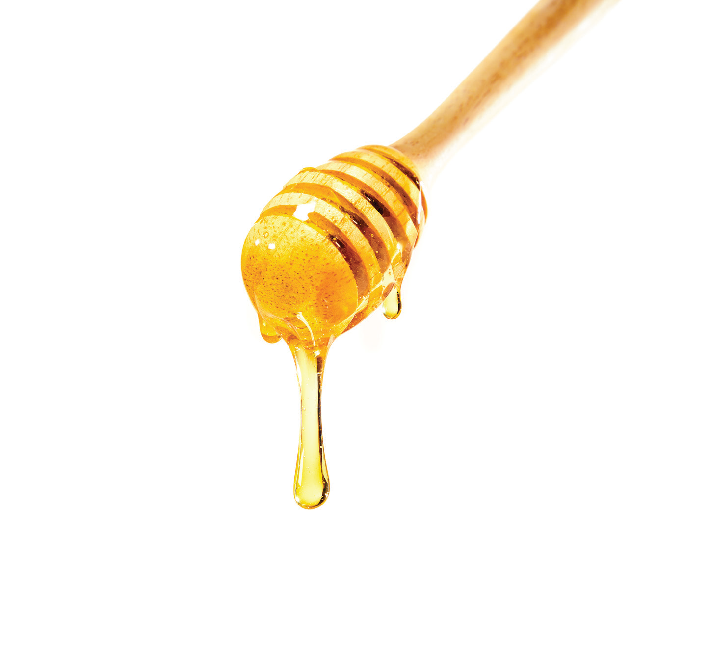 Мед на темном фоне. Dripping honey. Мед стекает. Потеки меда. Dripping honey.